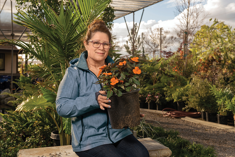 Elodia Estrada, who received surgery for nasal polyps, enjoys a day out at the garden center